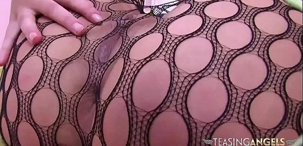  Teen in fishnets teases with her sexy ass and long legs